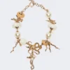 „Abissi“ Choker-Halskette aus Metall und Raffia, gold „Abissi“ Choker-Halskette aus Metall und Raffia, gold