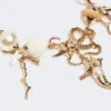 „Abissi“ Choker-Halskette aus Metall und Raffia, gold „Abissi“ Choker-Halskette aus Metall und Raffia, gold