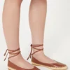 Ballerinas aus Nappa und Raffia, tabakfarben Ballerinas aus Nappa und Raffia, tabakfarben