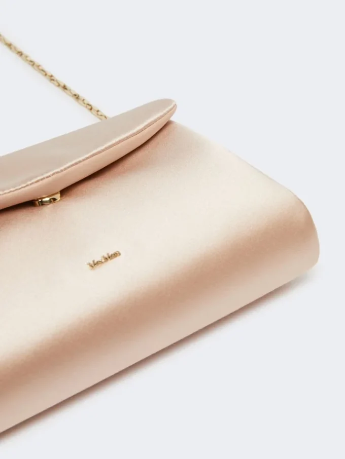 Clutch aus Viskose und Seidensatin, puderfarben Clutch aus Viskose und Seidensatin, puderfarben
