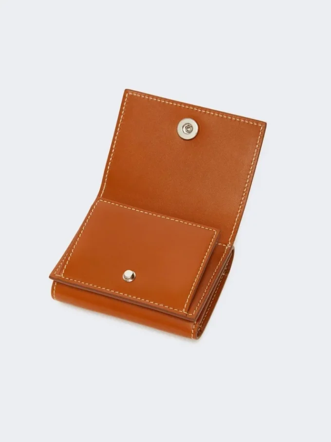 Dreifach gefaltete Geldbörse aus Leder, rostrot Dreifach gefaltete Geldbörse aus Leder, rostrot