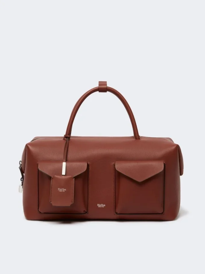Große Boston-Tasche aus Leder mit Taschen, rostfarben Große Boston-Tasche aus Leder mit Taschen, rostfarben
