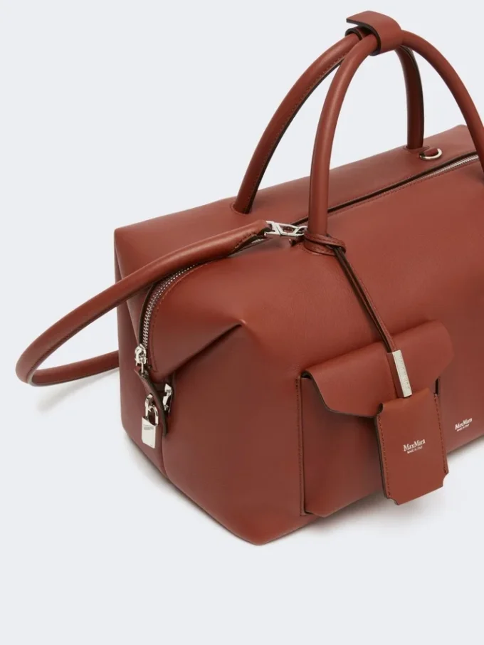 Große Boston-Tasche aus Leder mit Taschen, rostfarben Große Boston-Tasche aus Leder mit Taschen, rostfarben