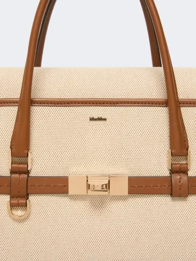 Handtasche aus Baumwoll-Canvas und Leder, puderfarben Handtasche aus Baumwoll-Canvas und Leder, puderfarben