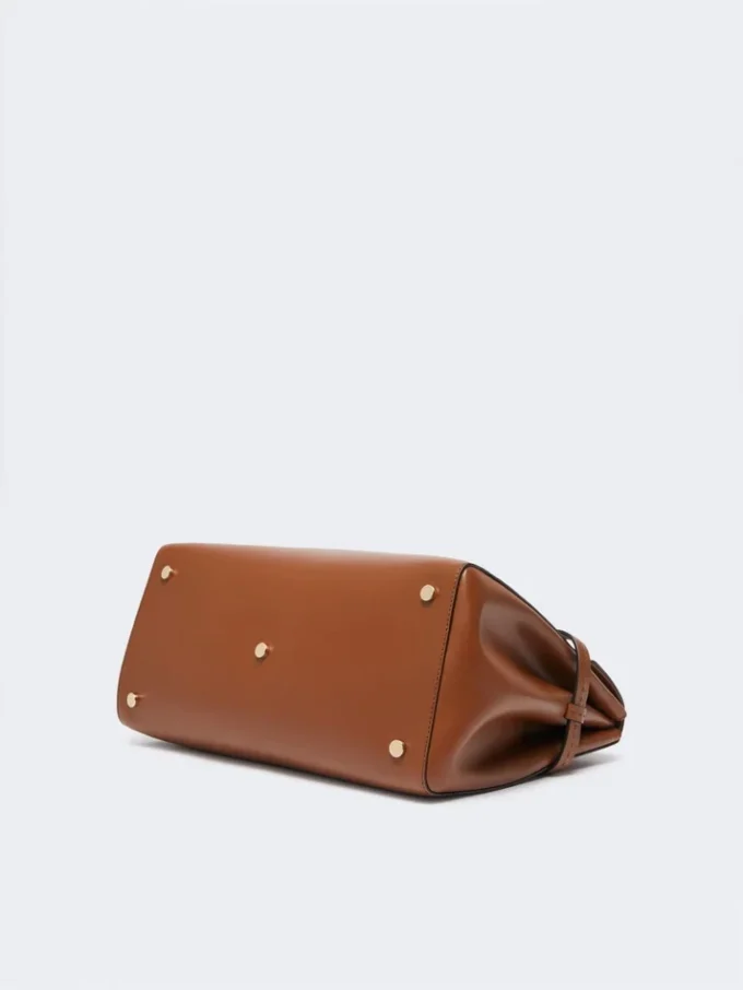 Handtasche aus Naturleder, bernsteinfarben Handtasche aus Naturleder, bernsteinfarben