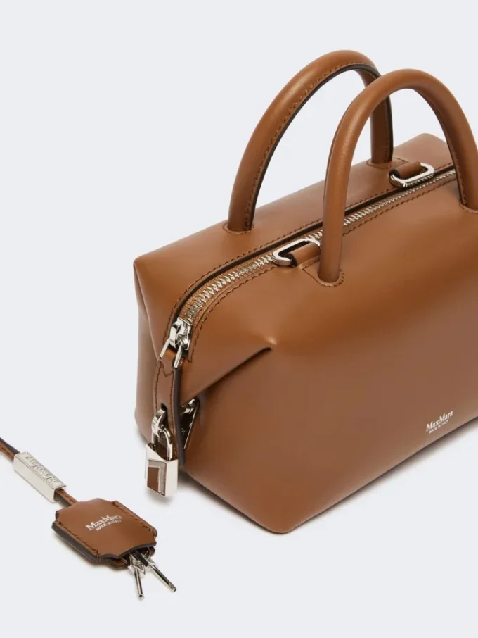 Kleine Bowler-Tasche aus naturbelassenem Leder, bernsteinfarben Kleine Bowler-Tasche aus naturbelassenem Leder, bernsteinfarben