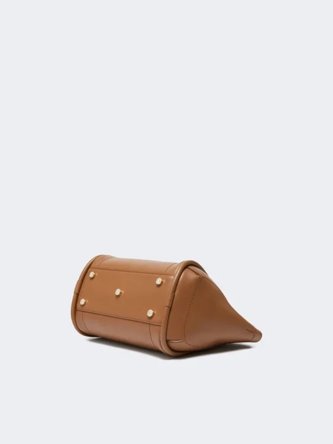 Kleine Marine-Handtasche aus Leder, braun-bronzefarben Kleine Marine-Handtasche aus Leder, braun-bronzefarben