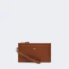 Leder-Täschchen mit Handgelenkriemen, bernsteinbraun Leder-Täschchen mit Handgelenkriemen, bernsteinbraun
