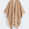 Poncho aus Jacquard-Wolle, kamelfarben Poncho aus Jacquard-Wolle, kamelfarben