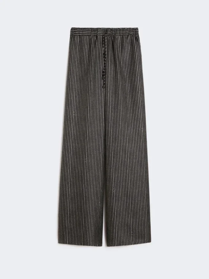 Weit geschnittene Seidenhose mit Print, schwarz-weiß
