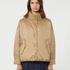 Wendbare, wattierte Jacke aus wasserabweisendem Canvas, haselnussbraun Wendbare, wattierte Jacke aus wasserabweisendem Canvas, haselnussbraun